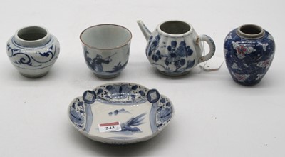 Lot 243 - A small Chinese teapot of compressed melon...