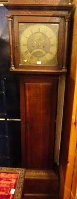 Lot 1139 - A circa 1800 provincial oak longcase clock,...