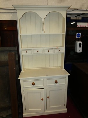 Lot 1151 - A modern white painted pine narrow kitchen...