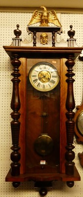 Lot 1166 - An early 20th century walnut Vienna regulator...