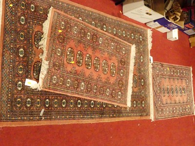 Lot 1181 - A Persian style machine woven pink ground...