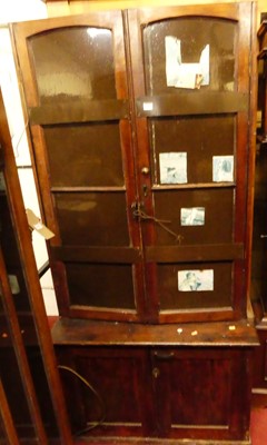 Lot 1202 - A stained pine and metal bound side cupboard,...