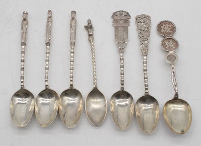 Lot 345 - A set of three Chinese white metal spoons,...