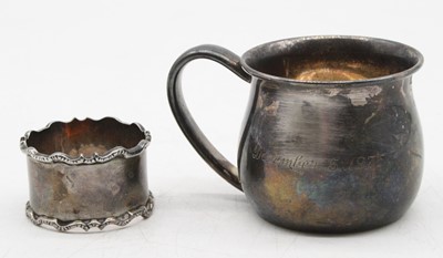 Lot 363 - A 20th century silver christening mug, of...