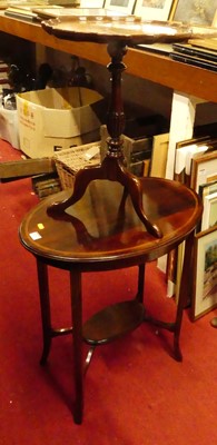 Lot 1216 - An Edwardian mahogany oval two-tier occasional...