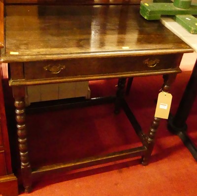 Lot 1230 - An antique joined oak bobbin turned single...