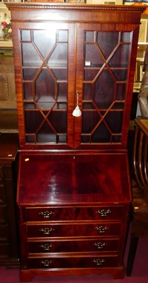 Lot 1244 - A reproduction yew wood bureau bookcase,...