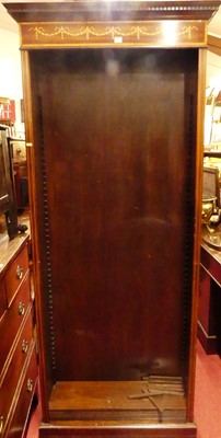 Lot 1253 - A contemporary mahogany freestanding open...