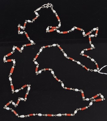 Lot 397 - A white metal, cultured pearl and coral set...