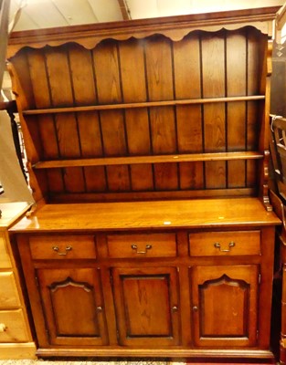 Lot 1260 - A contemporary joined oak Welsh dresser,...