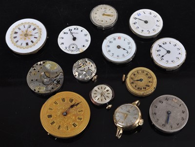 Lot 425 - Assorted watch movements and some dials to...