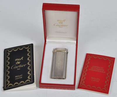 Lot 479 - A Must de Cartier Briquet steel and gold...