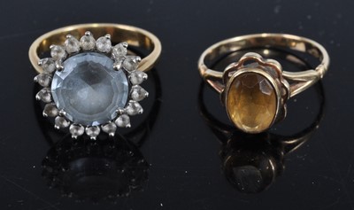 Lot 481 - A 9ct gold and citrine set dress ring, size M;...