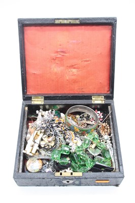 Lot 489 - A leather clad jewellery box and contents, to...