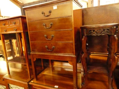 Lot 1284 - An Edwardian mahogany four drawer music chest;...