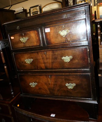 Lot 1286 - A small walnut chest of two short over two...