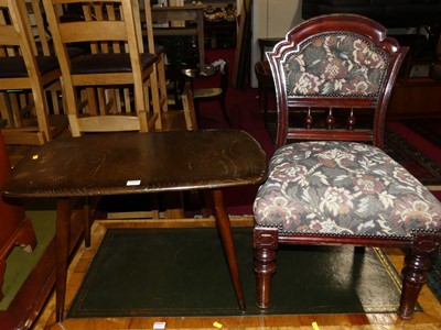 Lot 1309 - An Ercol dark elm low occasional table, length...