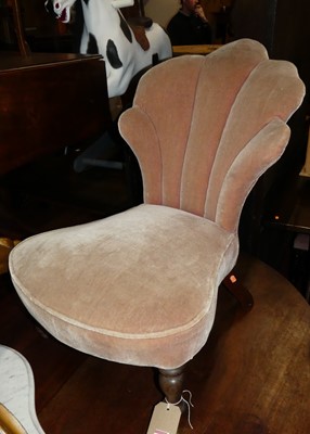 Lot 1319 - An upholstered shaped back nursing chair,...