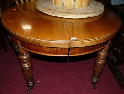 Lot 1327 - A late Victorian walnut D-end extending dining...