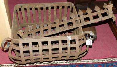 Lot 1348 - A wrought iron firegrate