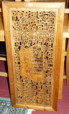 Lot 1350 - A Chinese carved and stained pine wall panel,...