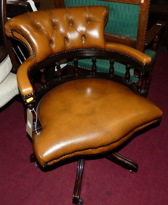 Lot 1379 - A contemporary mahogany tan leather buttoned...