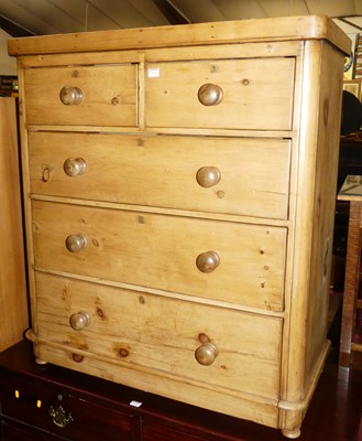 Lot 1405 - A Victorian pine round cornered chest of two...