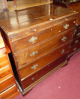 Lot 1413 - An early 19th century provincial oak chest of...