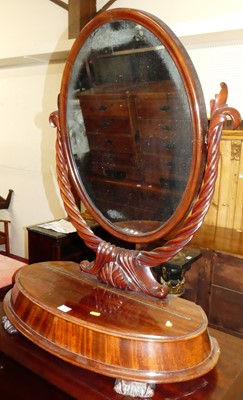 Lot 1418 - A large Victorian mahogany oval swing dressing...