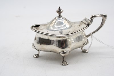 Lot 519 - A George V silver mustard of serptentine form...