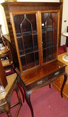 Lot 1425 - A circa 1900 mahogany double door glazed...