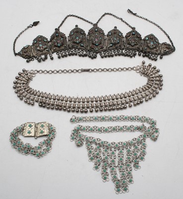 Lot 528 - An eastern white metal fringe type necklet,...