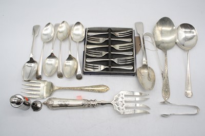 Lot 550 - A pair of George III silver sugar tongs,...