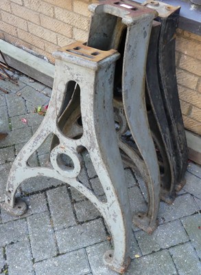 Lot 1439 - Two pairs of industrial cast iron table base...