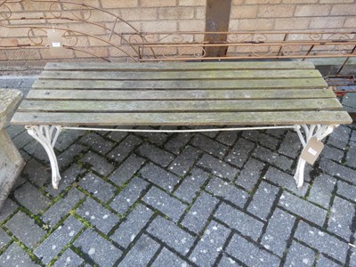 Lot 1441 - A slatted teak and painted galvanised cast...