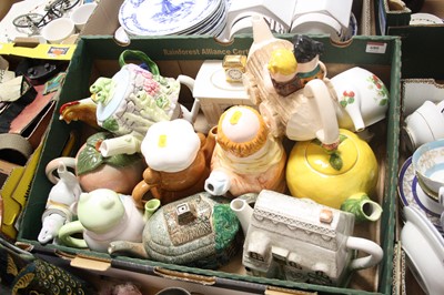 Lot 680 - Various novelty teapots, to include a...