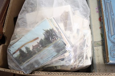 Lot 568 - An early 20th century postcard album, the...