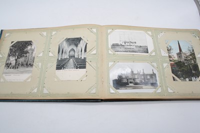 Lot 568 - An early 20th century postcard album, the...