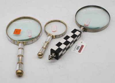 Lot 588 - A novelty oversize magnifying glass, having a...