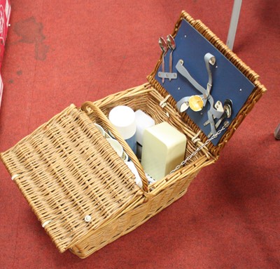 Lot 726 - A wicker cased picnic set