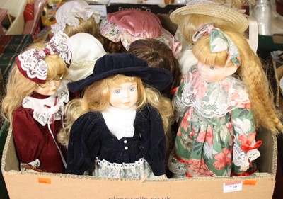 Lot 730 - A box of nine 20th century bisque headed dolls