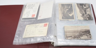 Lot 624 - An album of early 20th century postcards,...