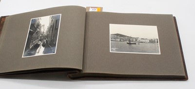 Lot 626 - An early 20th century photograph album,...