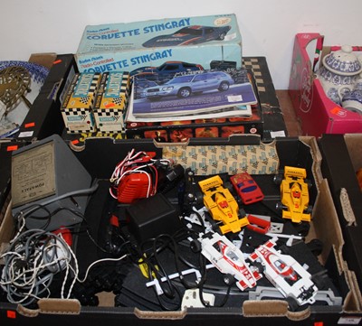 Lot 748 - Two boxes of various Scalextric and other slot...