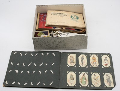 Lot 628 - A collection of cigarette cards, to include...