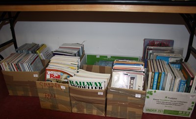 Lot 763 - Nine boxes of books, DVDs, and VHS, relating...