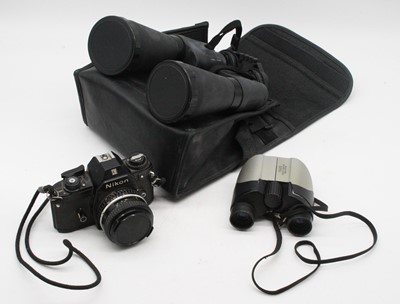 Lot 653 - A Nikon M90 camera together with a pair of...