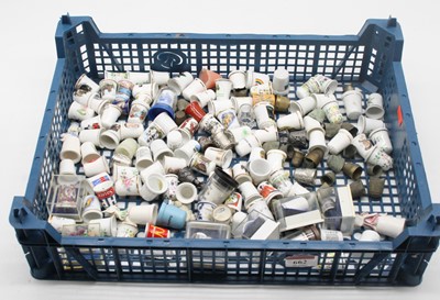 Lot 662 - A large collection of mainly porcelain thimbles