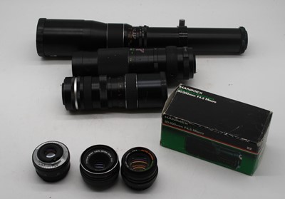 Lot 669 - A collection of assorted camera lenses to...