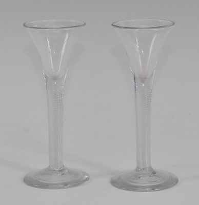 Lot 2116 - A pair of circa 1750 wine glasses, the drawn...